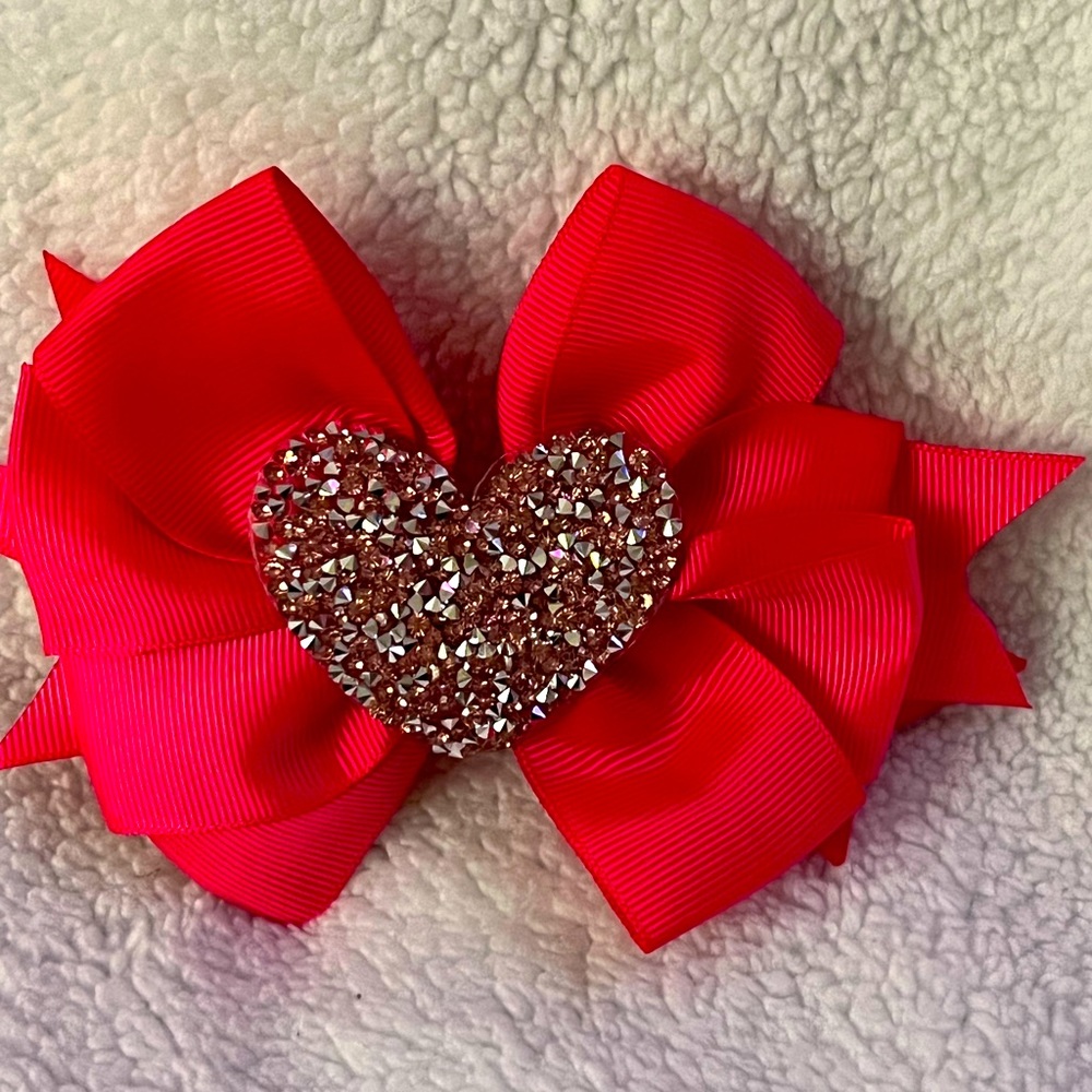 2 for $8 Pink medium sized bow with heart in middle girl bow